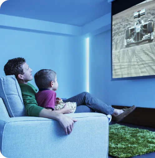 Family watching television together