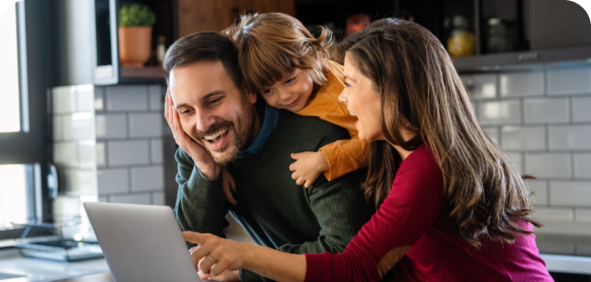 Family checking information on a laptop